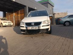 Фото авто Volkswagen Touran