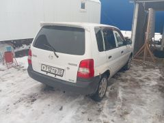 Photo of the vehicle Mazda Demio