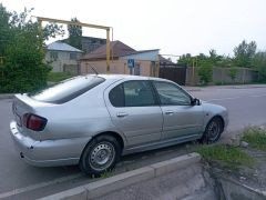 Фото авто Nissan Primera