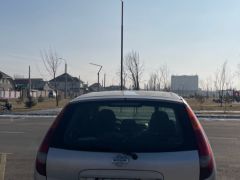 Сүрөт унаа Nissan Almera Tino