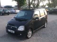 Photo of the vehicle Suzuki Wagon R+