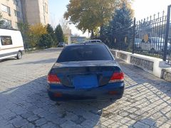 Сүрөт унаа Mitsubishi Lancer