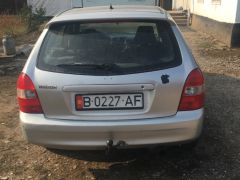 Photo of the vehicle Mazda 323