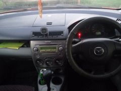 Photo of the vehicle Mazda Demio