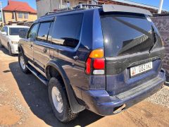 Сүрөт унаа Mitsubishi Montero Sport