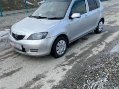 Фото авто Mazda Demio