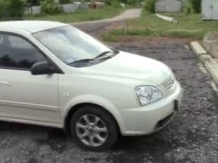 Сүрөт унаа Kia Carens