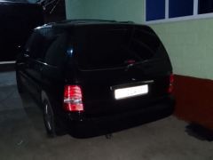 Photo of the vehicle Kia Carnival