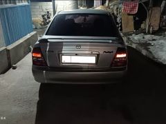 Фото авто Mazda Protege