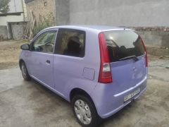 Photo of the vehicle Daihatsu Cuore