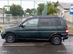 Фото авто Mazda Demio