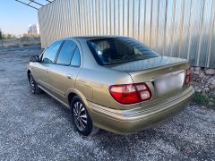 Photo of the vehicle Nissan Sunny