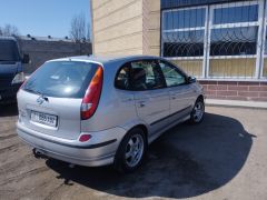 Фото авто Nissan Almera Tino