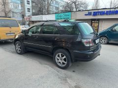 Photo of the vehicle Lexus RX