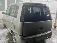 Сүрөт унаа Nissan Cube