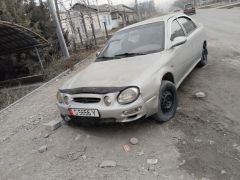 Фото авто Kia Shuma