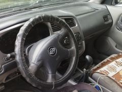 Photo of the vehicle Nissan Primera