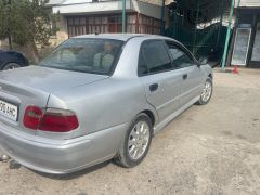 Сүрөт унаа Mitsubishi Carisma