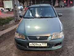 Сүрөт унаа Mitsubishi Space Star