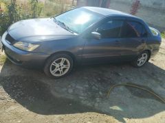 Сүрөт унаа Mitsubishi Lancer