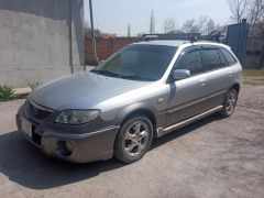 Фото авто Mazda Familia