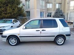 Сүрөт унаа Toyota Raum