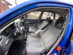 Photo of the vehicle Mazda 323