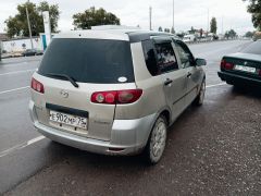 Photo of the vehicle Mazda Demio
