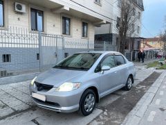 Photo of the vehicle Honda Fit Aria