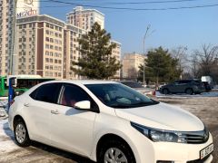 Photo of the vehicle Toyota Corolla