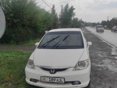 Photo of the vehicle Honda Fit Aria