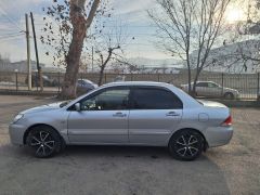 Фото авто Mitsubishi Lancer