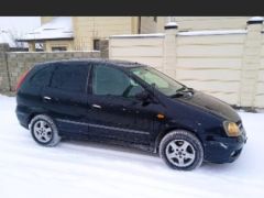 Фото авто Nissan Almera Tino