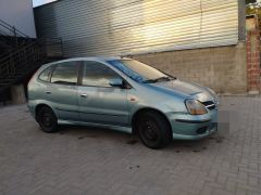 Фото авто Nissan Almera Tino