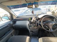 Фото авто Toyota Ipsum