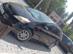 Photo of the vehicle Toyota Prius v (+)