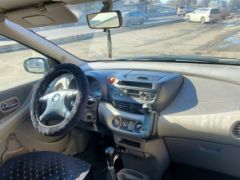 Сүрөт унаа Nissan Almera Tino