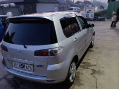 Photo of the vehicle Mazda Demio