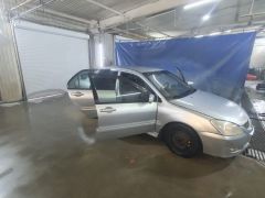 Сүрөт унаа Mitsubishi Lancer