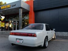 Фото авто Nissan Laurel