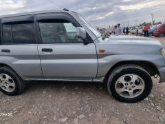 Сүрөт унаа Mitsubishi Pajero iO