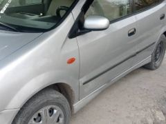 Photo of the vehicle Nissan Almera Tino