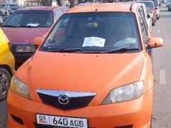 Photo of the vehicle Mazda Demio