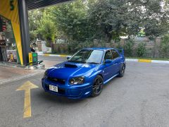 Фото авто Subaru Impreza WRX STi