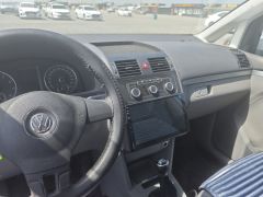 Фото авто Volkswagen Touran