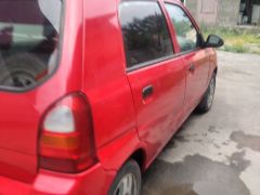 Photo of the vehicle Suzuki Alto