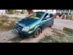 Photo of the vehicle Nissan Almera Tino