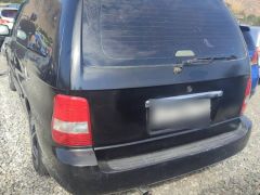 Photo of the vehicle Kia Carnival