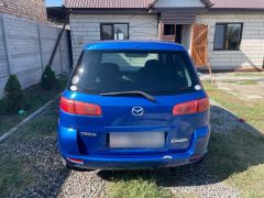 Сүрөт унаа Mazda Demio