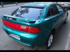 Photo of the vehicle Mazda 323